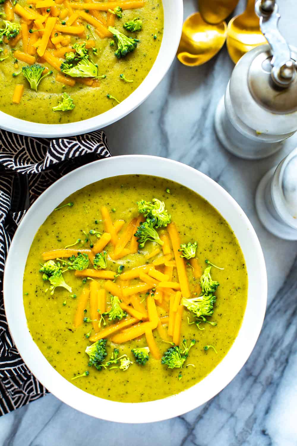bowls of healthy broccoli cheese soup