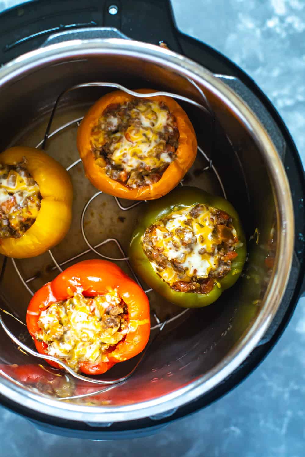 low carb Instant Pot Stuffed Peppers in electric pressure cooker