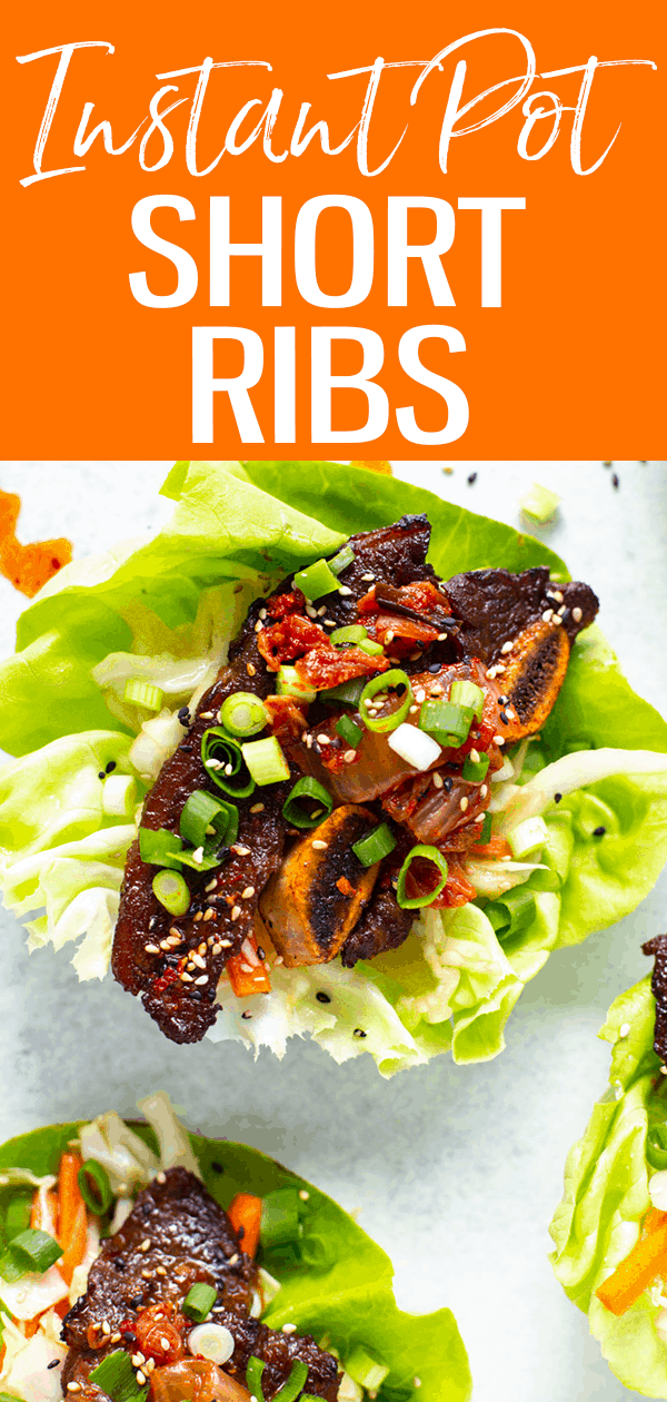These are the very best Instant Pot Short Ribs - the Korean-inspired marinade is to die for, served with slaw and kimchi over lettuce wraps. #instantpot #shortribs