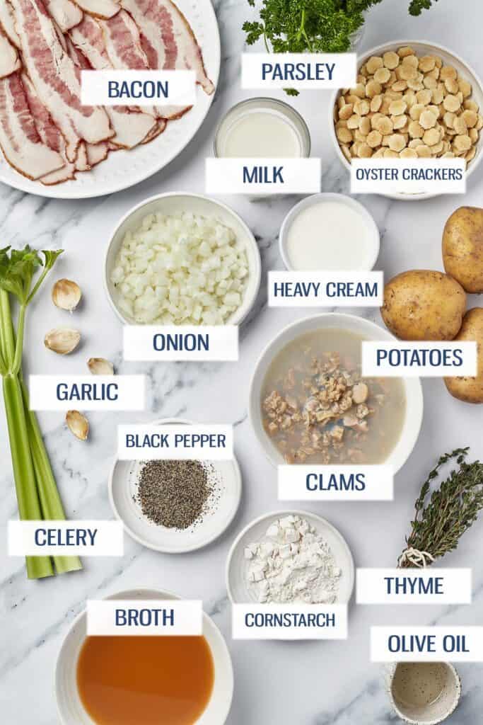 Ingredients for Instant Pot clam chowder: bacon, parsley, celery, garlic, onion, heavy cream, potatoes, clams, cornstarch, broth, thyme, olive oil, black pepper, and oyster crackers. 